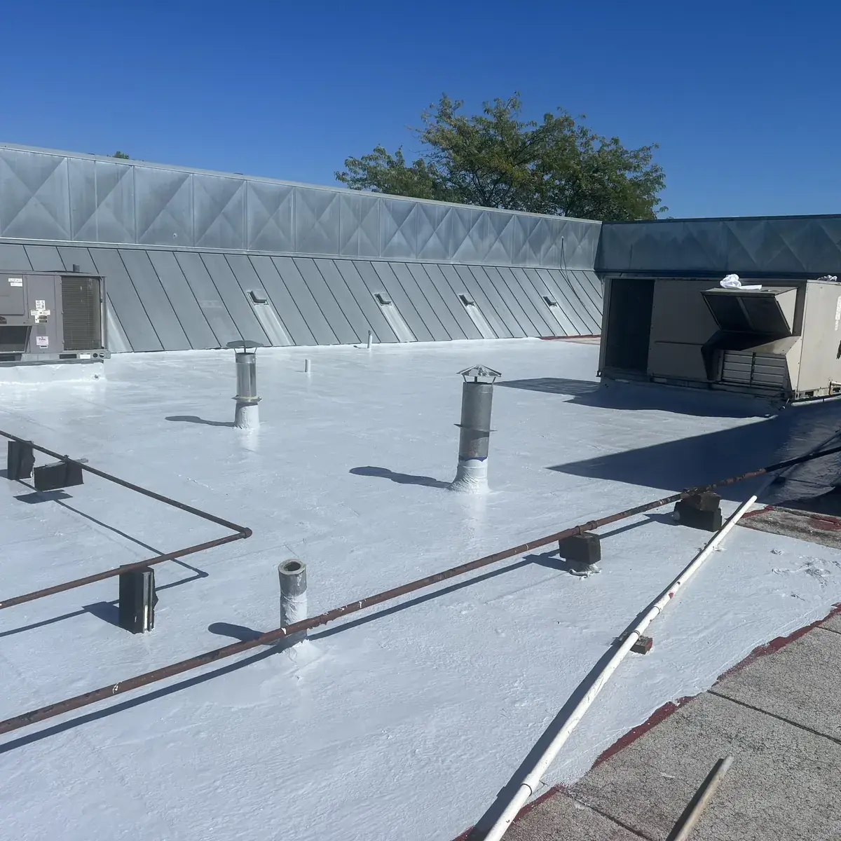 09-03-certified-crews-prep-and-apply__liquid-applied-membrane-woodfield-Primer_and_1st_coat