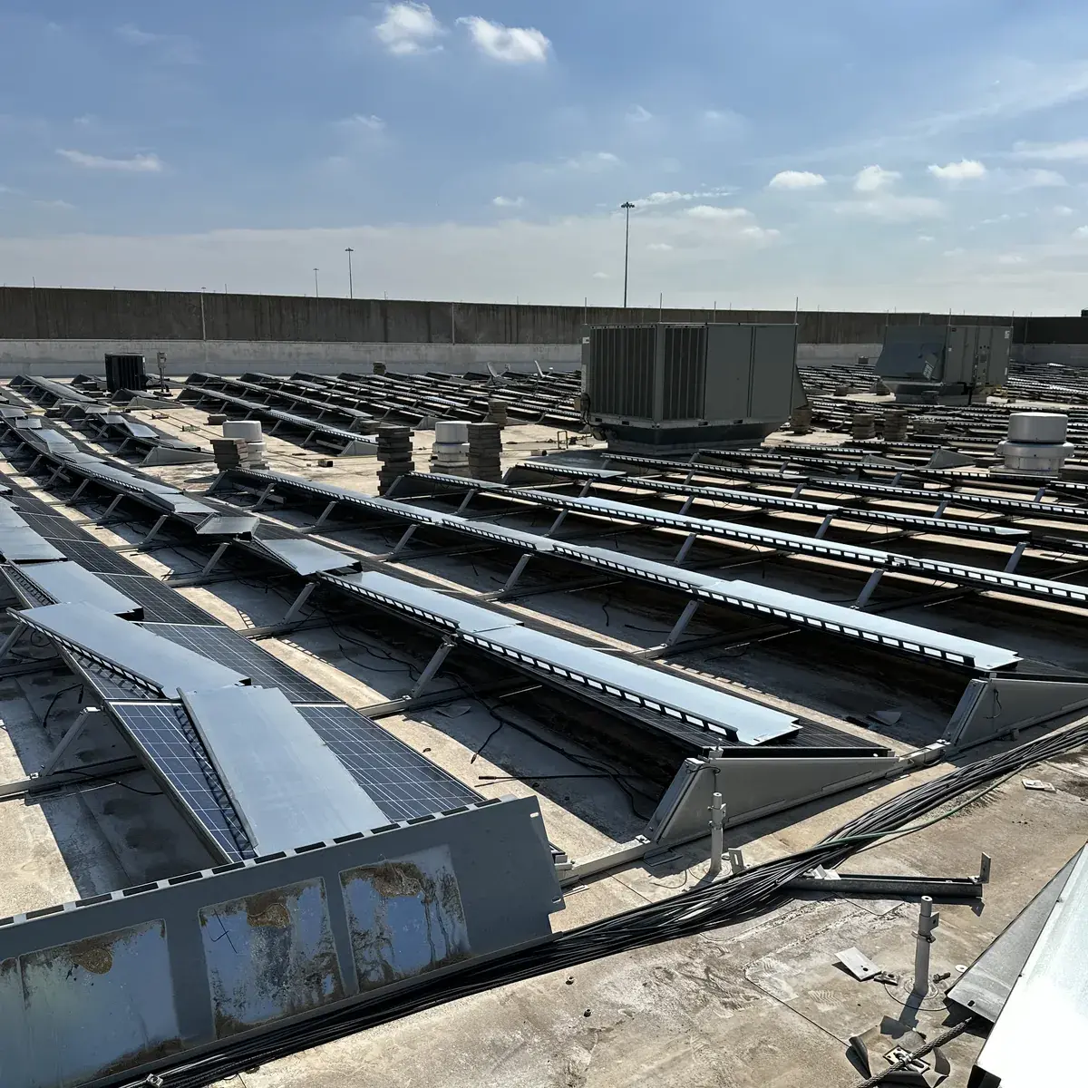 06-02-certified-crews-take-the-array-down-safely__solar-roofing-ballast_and_panel_removal