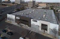 Aerial view of REI store with commercial flat roof, Denver, CO