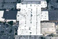 Aerial view of white TPO rooftop on commercial building, Baltimore, MD