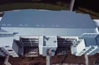 Aerial view of multi-story building with blue TPO roof, Coral Springs, FL.