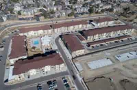 Aerial view: Denver commercial complex roof with TPO membrane installation