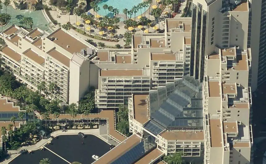 Aerial view of Marriott Resort Orlando’s flat roofs and glass pyramid structure.